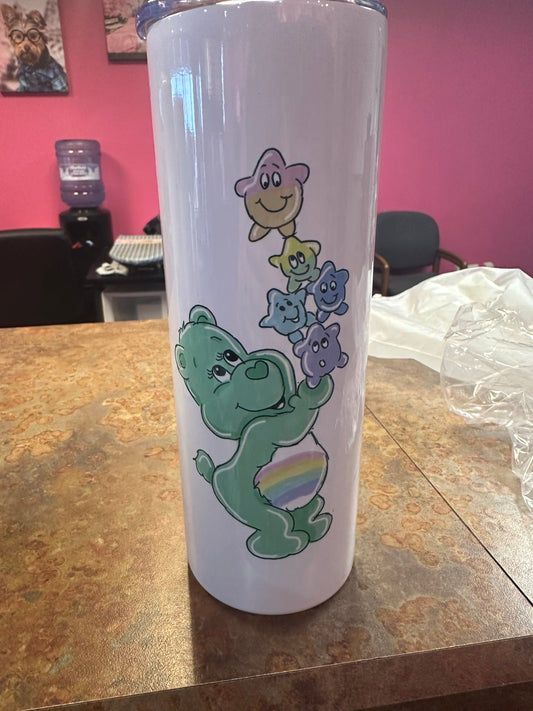 Green bear w rainbow stars.  20 ounce tumbler