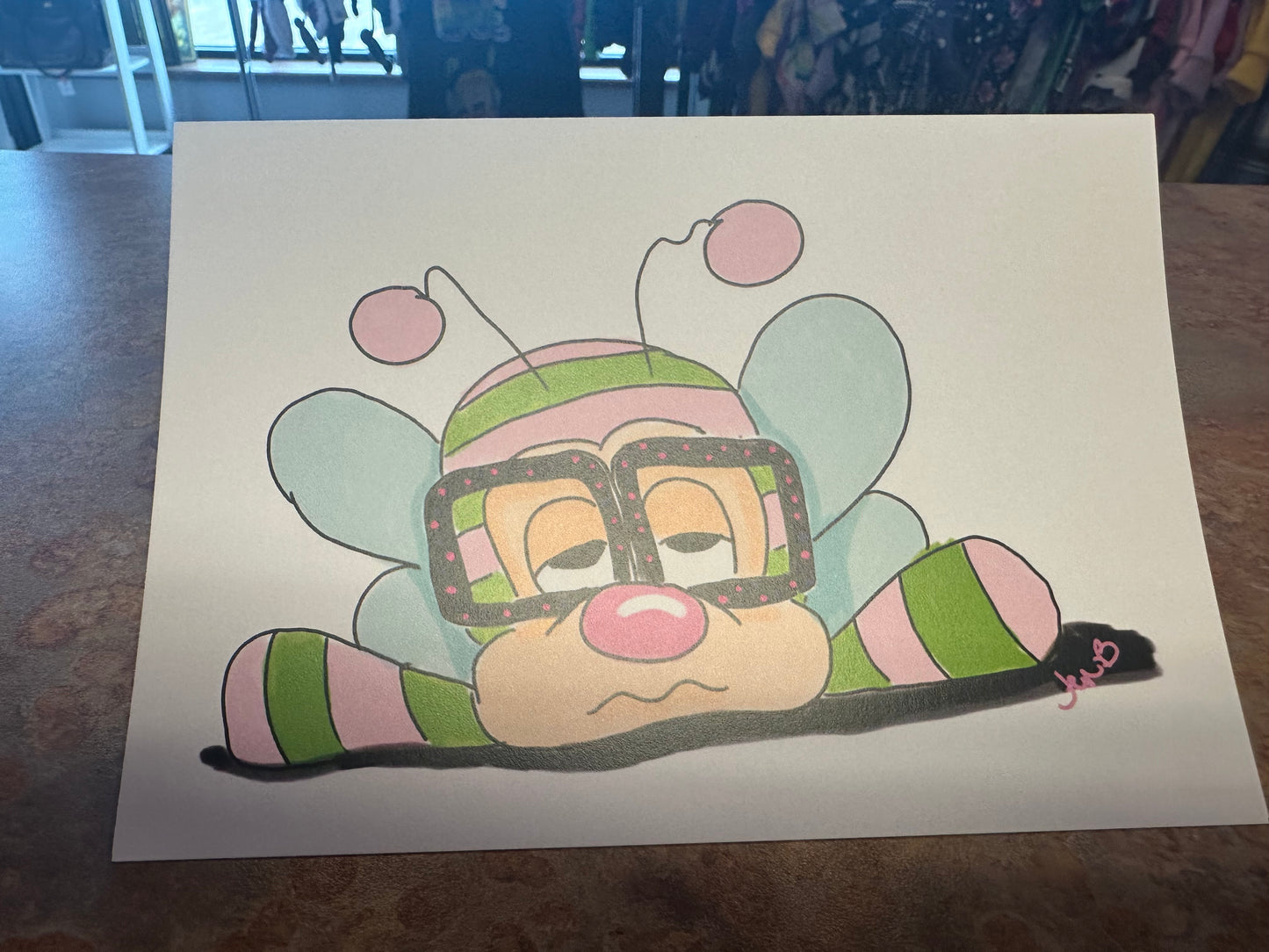 Pink and green bug w glasses