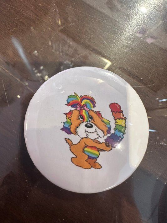 Shizu with rainbow ice cream button.